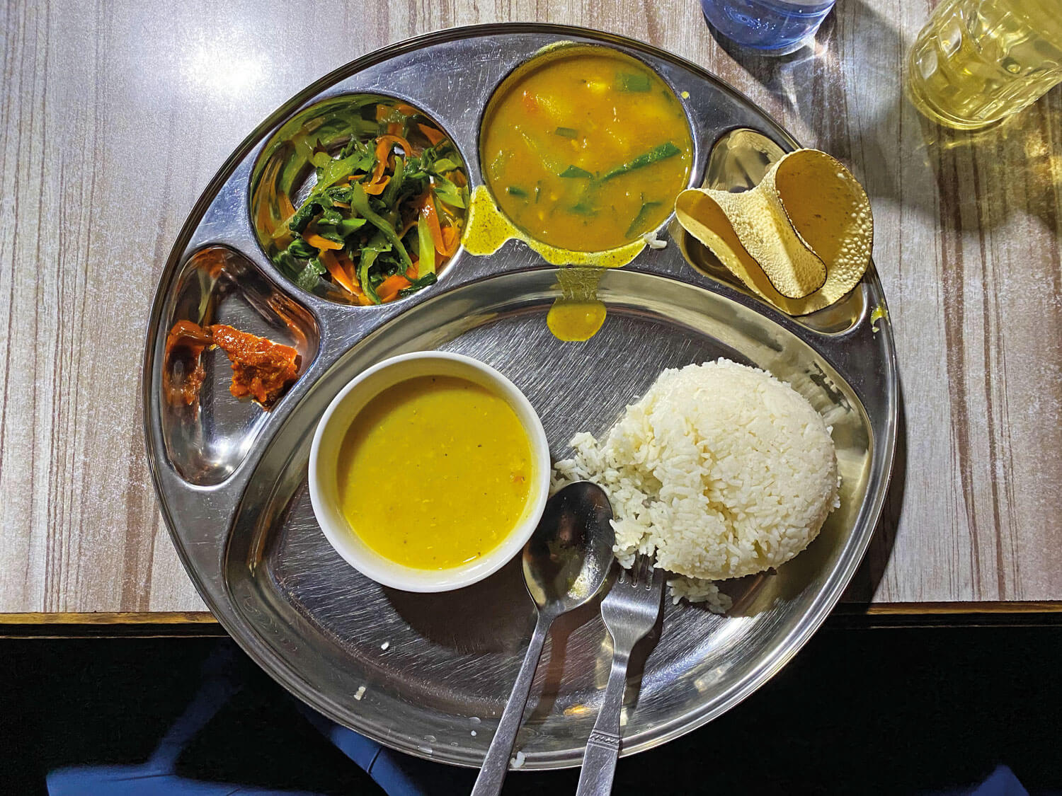 The classic Nepalese meal, dal bhat, with rice, lentils and vegetables.